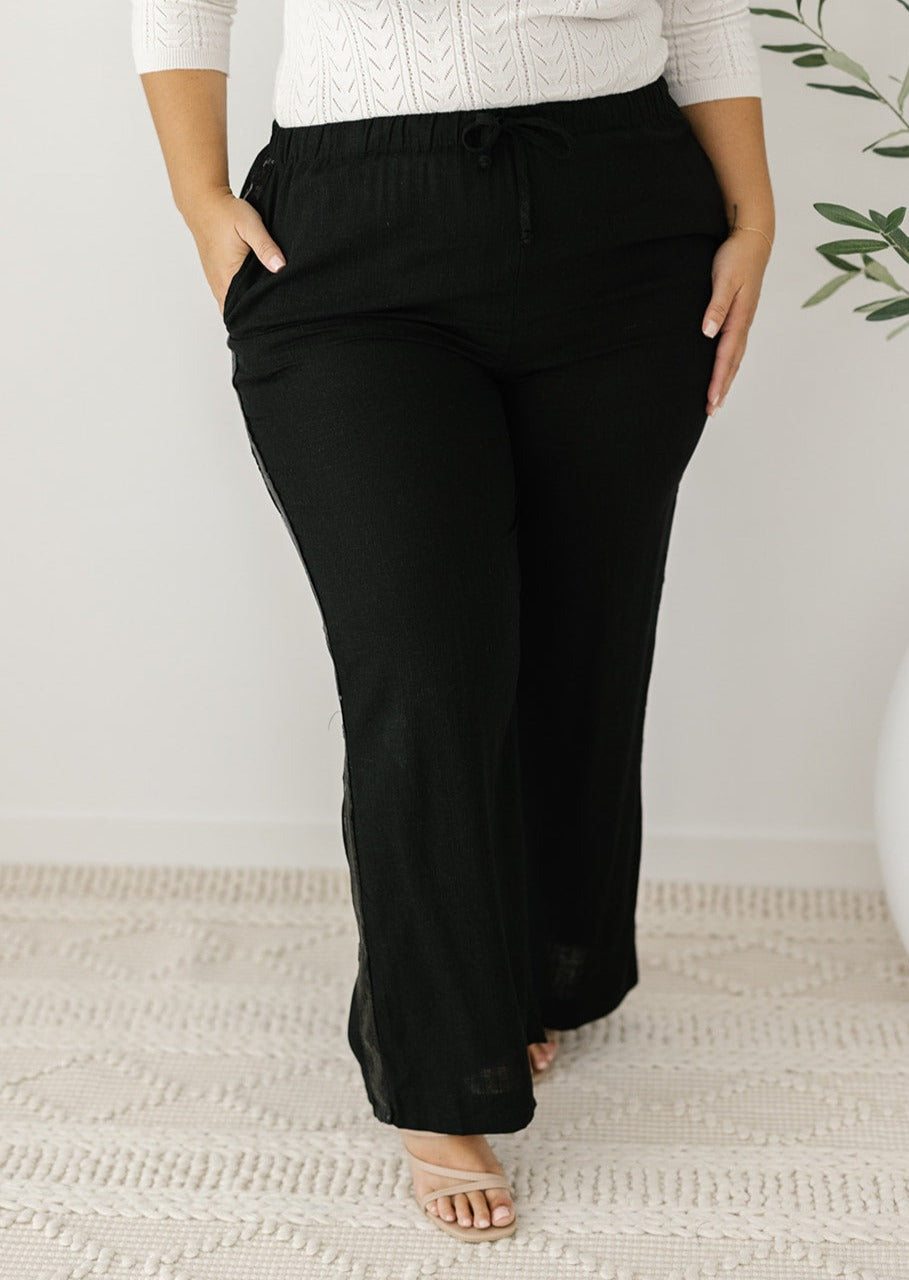 black lightweight pants with elastic waist and pockets